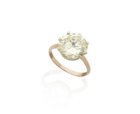 BAGUE SOLITAIRE DIAMANTSertie griffe d'un diamant de taille brillant pesant 4.95 carats sur une monture en or blanc et en or 