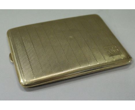A 9 carat gold engine turned cigarette case bearing initials "JWB", 113g