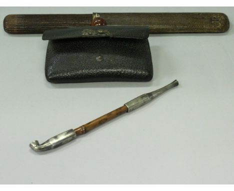 A 19th Century opium pipe and case with Carnelian bead and leather opium pouch