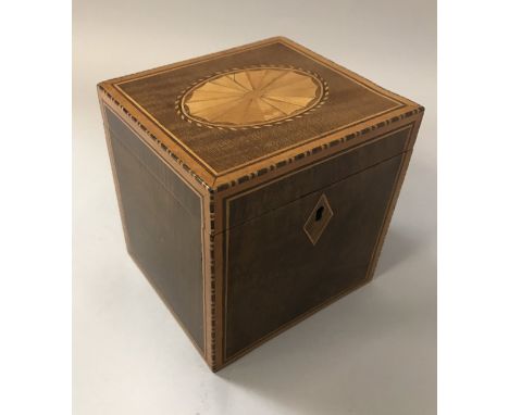 A 19th Century mahogany and marquetry inlaid single section tea caddy with fan inlaid medallion to the top CONDITION REPORTS 