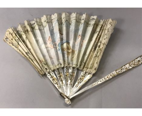 A 19th Century French mother of pearl stick fan with hand painted decoration of classical maiden amongs clouds with cherubs s