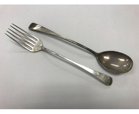 A pair of Georgian silver "Old English" pattern serving spoon and fork (maker's mark rubbed, London 1751), 6 ozt