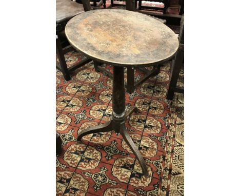 A 19th Century decoupage decorated pine occasional table on tripod base