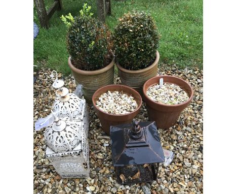 A collection of garden pots and tools etc.