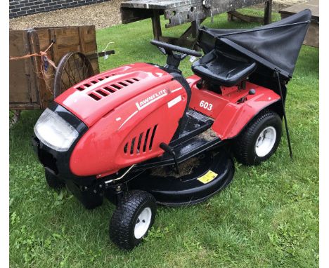 A Lawnflite 603 ride on lawnmower CONDITION REPORTS not had it running damage to front light and a flat tyre