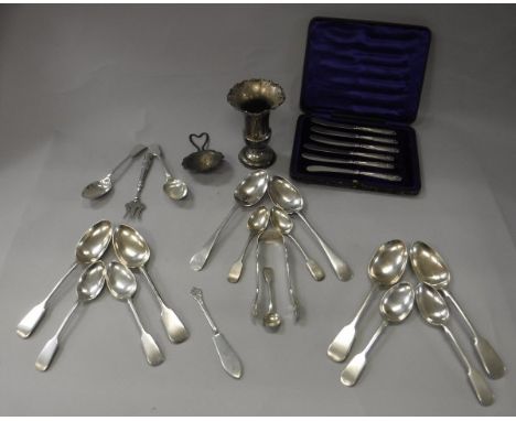 A collection of various silver wares to include four Fiddle pattern table spoons, six Fiddle pattern dessert spoons (all by C