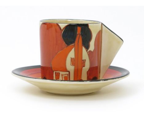 'Farmhouse' a Clarice Cliff Bizarre Conical coffee can and saucer, painted in colours printed factory marks, 6.5cm. high (2)