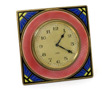 An Art Deco enamelled metal travelling desk clock, with easel back, square section, enamelled with blue and yellow geometric 
