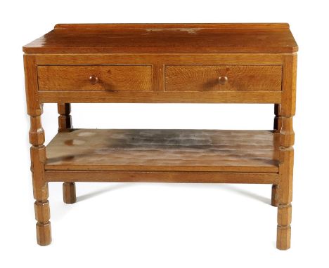 A Robert Mouseman Thompson oak Hall table, rectangular carved adzed top, two drawers above open shelf, carved mouse signature