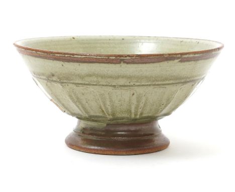 ‡  Richard Batterham (born 1936) a cut-sided stoneware footed bowl, covered in an ash glaze, unsigned, 24cm. diam.