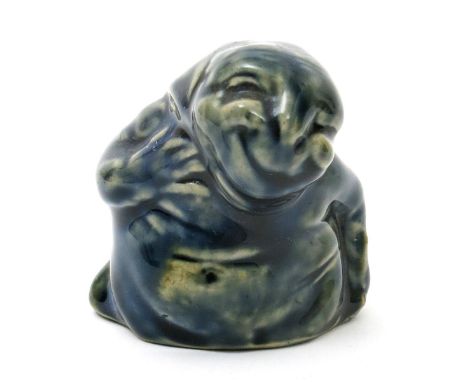 A Royal Doulton stoneware grotesque designed by Mark V. Marshall,  modelled as a grotesque creature, covered in a green blue 