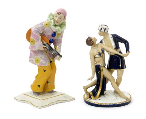 A porcelain sculpture of two dancers probably by Royal Dux,  model no.2993. modelled in exotic costume, probably based on Rud