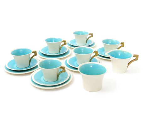 A Clarice Cliff Bizarre Daffodil tea set for six, decorated in blue on a cream ground, the handles highlighted in gilt, compr