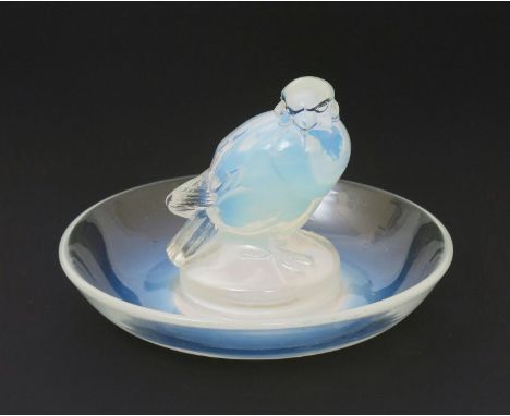 'Moineau' no. 284 a Lalique opalescent glass cendrier designed by Rene Lalique, etched R Lalique France no. 284, 9cm. diam.