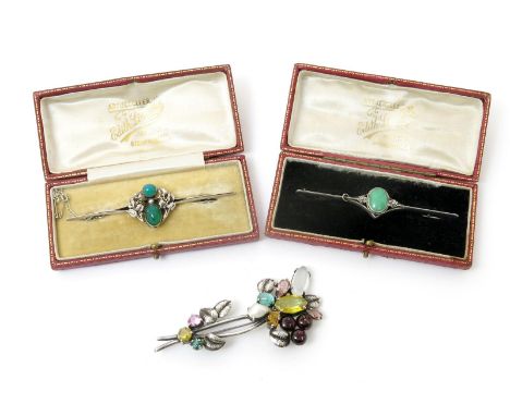 A silver and chrysoprase bar brooch by Edith Linnell,  with central pierced and cast foliate panel set with two stones and a 