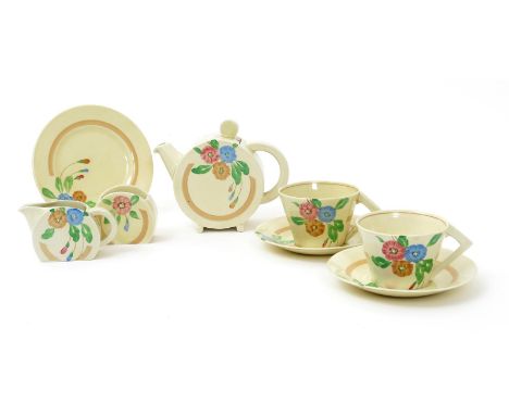 A Clarice Cliff Bon Jour tea for two, painted with pink and green flowers, comprising,  Bon Jour teapot and cover, Stamford m