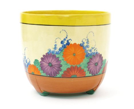 'Gay Day' a Clarice Cliff Bizarre Dover jardiniere, painted in colours on a honeyglaze ground, printed factory mark, 19cm. hi