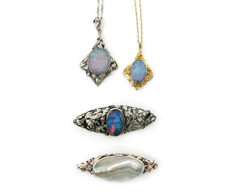 A silver and opal pendant necklace the design attributed to Rhoda Wager, pierced and cast frame of simple ivy leaves, on fanc