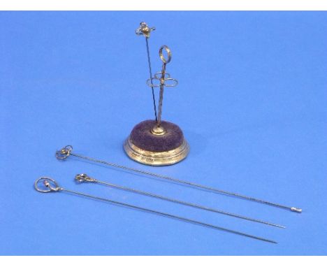 A George V silver Hatpin, by Charles Horner, hallmarked Chester 1923, the hinged finial with Art Nouveau style open heart, to