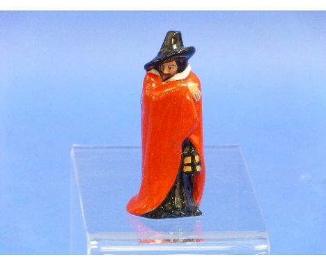 A Royal Worcester 'Abbess' Candle Snuffer, 3?in (9.25cm) high, together with a Royal Doulton Guy Fawkes figure, HN.3271, 4in 