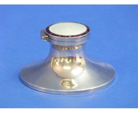 A George V silver Capstan Inkwell, by S. Blanckensee & Son Ltd., hallmarked Birmingham 1911, of traditional form, the hinged 