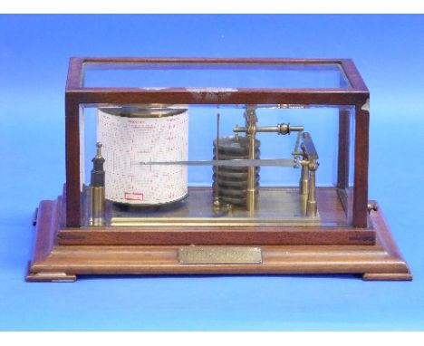 A vintage Barograph, of traditional form, with six vacuum sections and brass frame, in mahogany case with bevelled glass and 