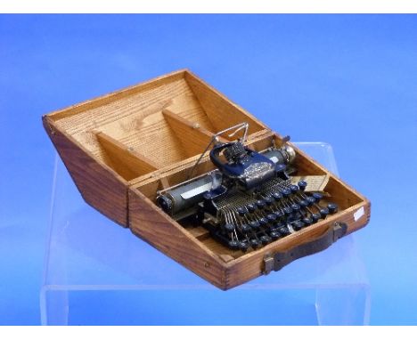 A Blickensderfer No 5 typewriter, circa 1892, having ZXKG 29 key action, the front set with plaque reading ""Newcastle-on-Tyn