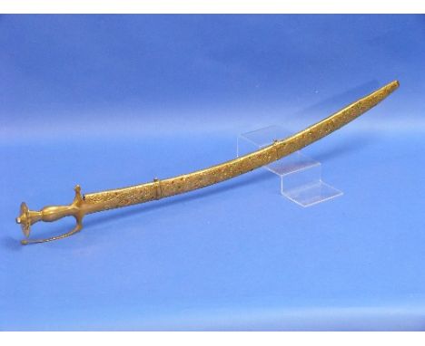 An Indian Tulwar presentation Sword, with typical hilt, in brass scabbard with coloured bead jewelling, the 33in (84cm) long 