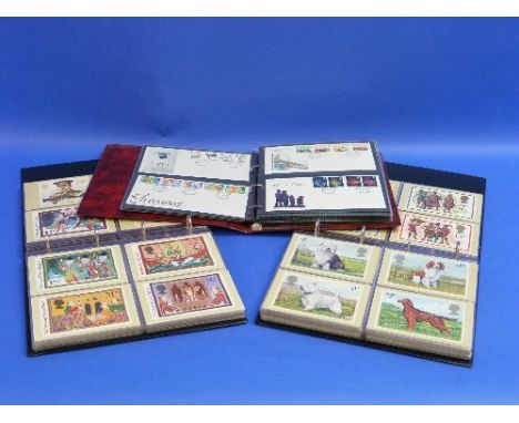 A quantity of First Day Covers in two Albums, together with a quantity of First Day Cards in another album (a lot)