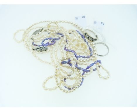 A mixed collection of Jewellery, including a platinum wedding band, 3.3g, Size M, a four strand baroque seed pearl necklace, 