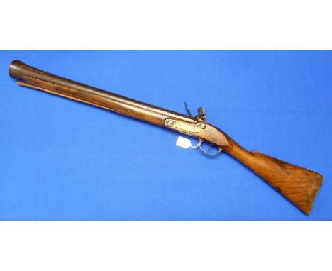 A 19th century Flintlock Blunderbuss, possibly continental, the 23in (58.25cm) steel barrel with Greek Key Swastika decoratio