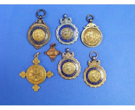 A 14ct gold The St. Johns Ambulance Association medal (12.5g), and two 9ct gold and enamel London Breweries Amateur Sports As