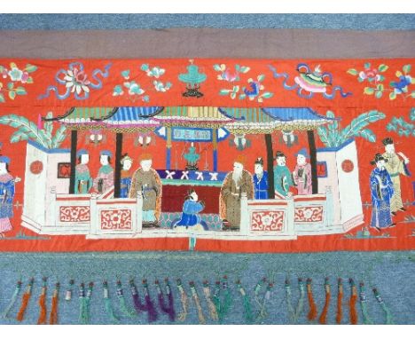An antique Chinese silk Wall Hanging, possibly a Tok Wi or a Bed Hanging, the red satin ground profusely hand embroidered in 