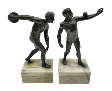 Bronzed model of the discus thrower and another of a episkyros player, both raised upon retangular plinths, H18cm