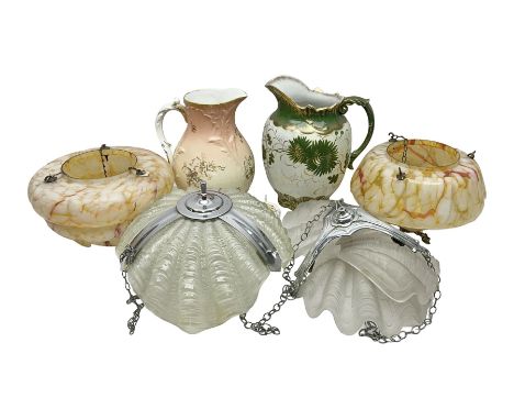 Two Art Deco mottled glass fly catcher ceiling light shades, together with two other 1930s moulded glass ceiling light shades