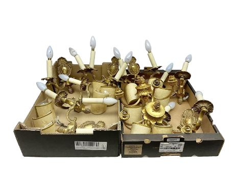 Pair of gilded ceiling light fittings, each with three branches, together with seven brass twin branch wall sconces, fittings
