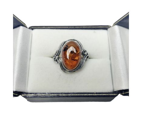 Silver Baltic amber ring, with leaf detail gallery, stamped 925, boxedCondition Report:Size Q
