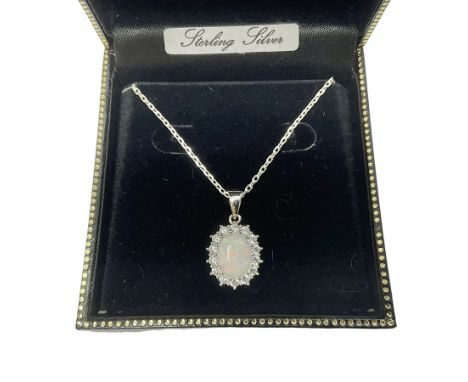 Silver opal and cubic zirconia cluster pendant necklace, stamped 925, boxed