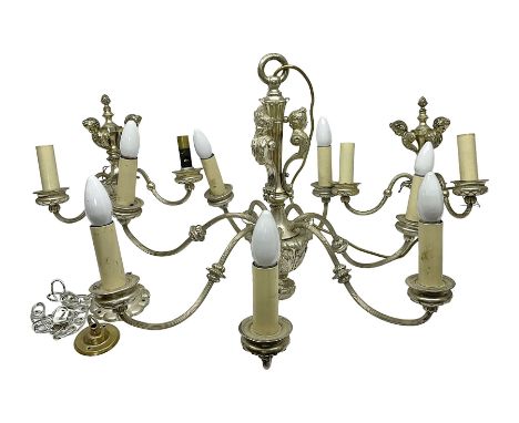 Siz branch silvered chandelier, decorated with acanthus leaves and putti, together with two matching three branch wall sconce