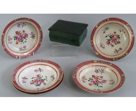 A set of five Chinese Famille Rose dishes, each enamelled to the centre with flowers and leaves within a floral and scale bor