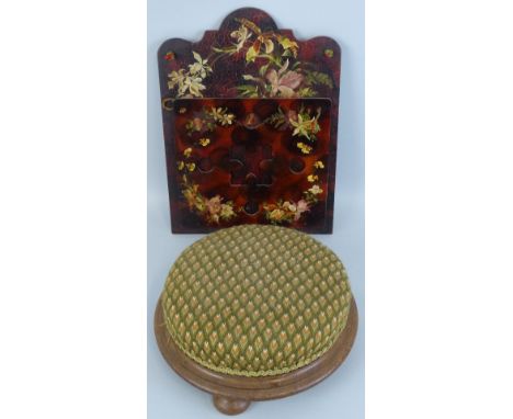 A Victorian walnut foot stool, of circular form with moulded edge, later tapestry top and three bun feet, 30cm diameter and a