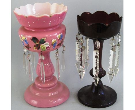 A Victorian ruby glass lustre vase, the dished top with undulating rim hung with clear glass lozenges and prism drops, on hol