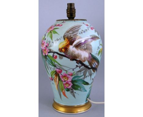 A table lamp, formed from a continental vase of inverted baluster form painted with a parrot perched on blossoming branches, 