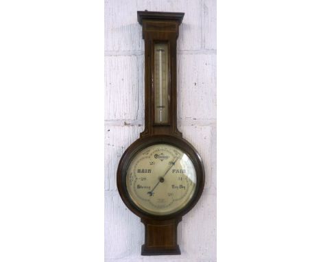 An early 20th Century walnut cased aneroid barometer, by Benn Franks Optician Hull, Hanley & Co, with plain moulded pediment 
