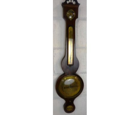 A 19th Century mahogany cased mercury barometer, by Davis Optician Cheltenham, the broken arched pediment with central finial