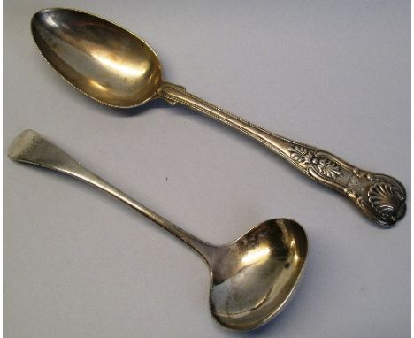 A Victorian table spoon, Kings pattern, crested, London 1862, together with an Edwardian Old English pattern sauce ladle, She