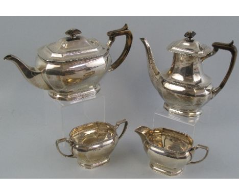 A four piece tea set, the teapot of bulbous octagonal form with panel moulded rim, ebonised domed finial on domed hinged lid 