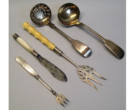 A Victorian sauce ladle, Fiddle pattern, London 1851, a Victorian sifter spoon, Fiddle pattern, monogrammed, London 1846, an 