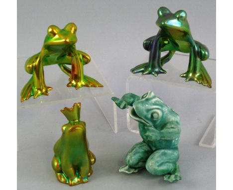 Three Zsolnay Pecs figures, of seated frogs, each with eosin lustre glaze, 7.5cm high and a Spode Royal Jade figure of a seat