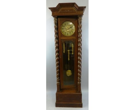 An early 20th Century longcase clock, the triple weight eight day movement marked Jsgus DRP with circular dial, silvered chap